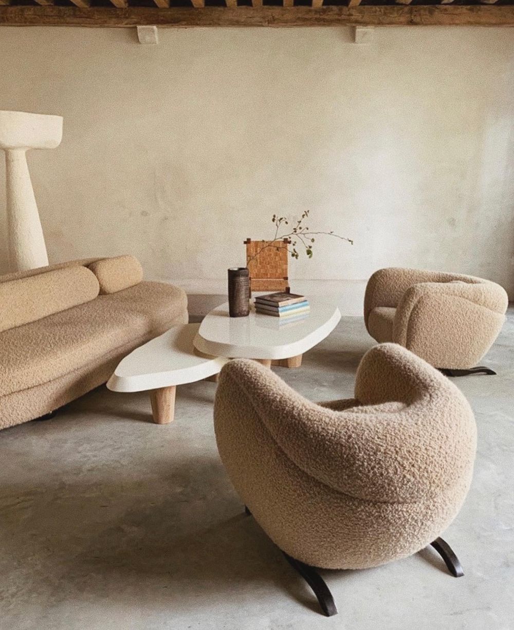 Beige boucle sofa and chairs @roanbarrion