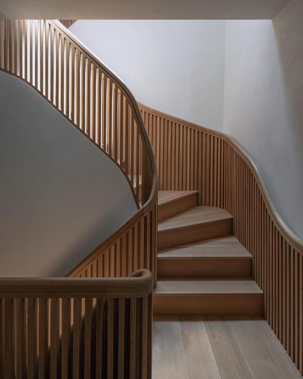 Wood slatt walls staircase @studio.jih