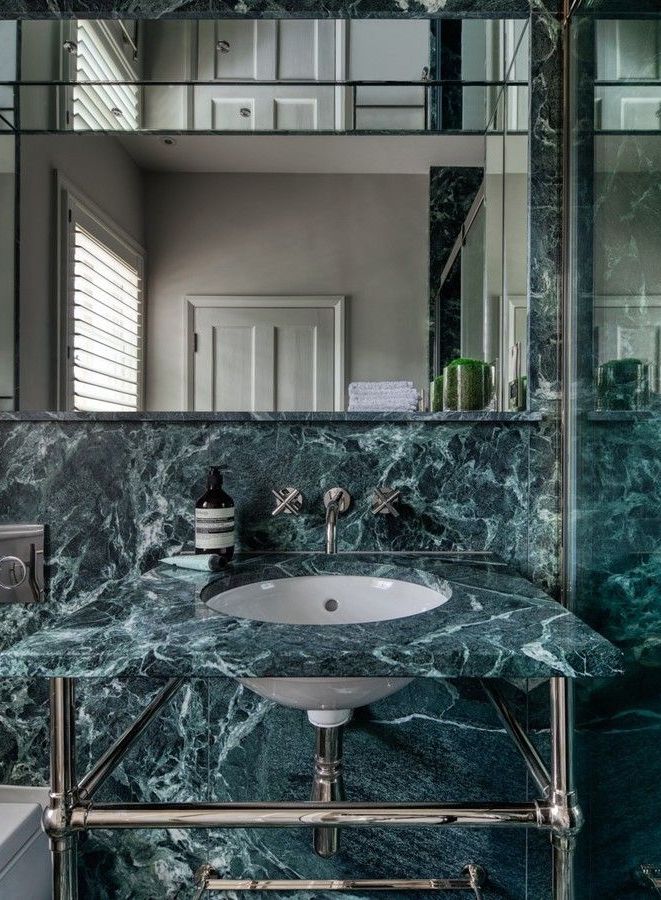Green marble bathroom walls vanity
