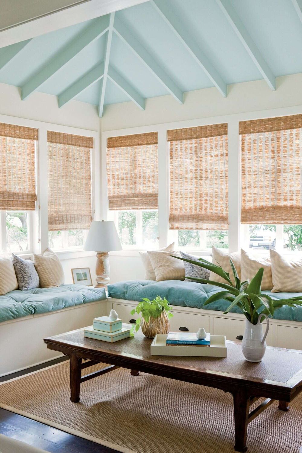 Sunroom ideas Built-in banquettes Bamboo shades southernliving mia james