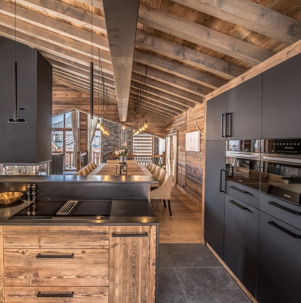 Ski Chalet kitchen with rustic wood cabinetry vallatgroupe