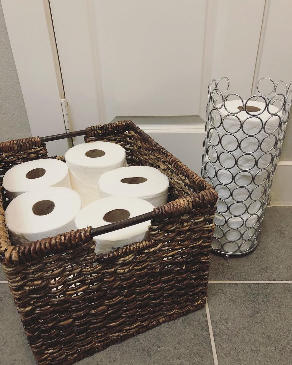 bathroom organization ideas toilet paper bin and stack of rolls sophisticatedorganization