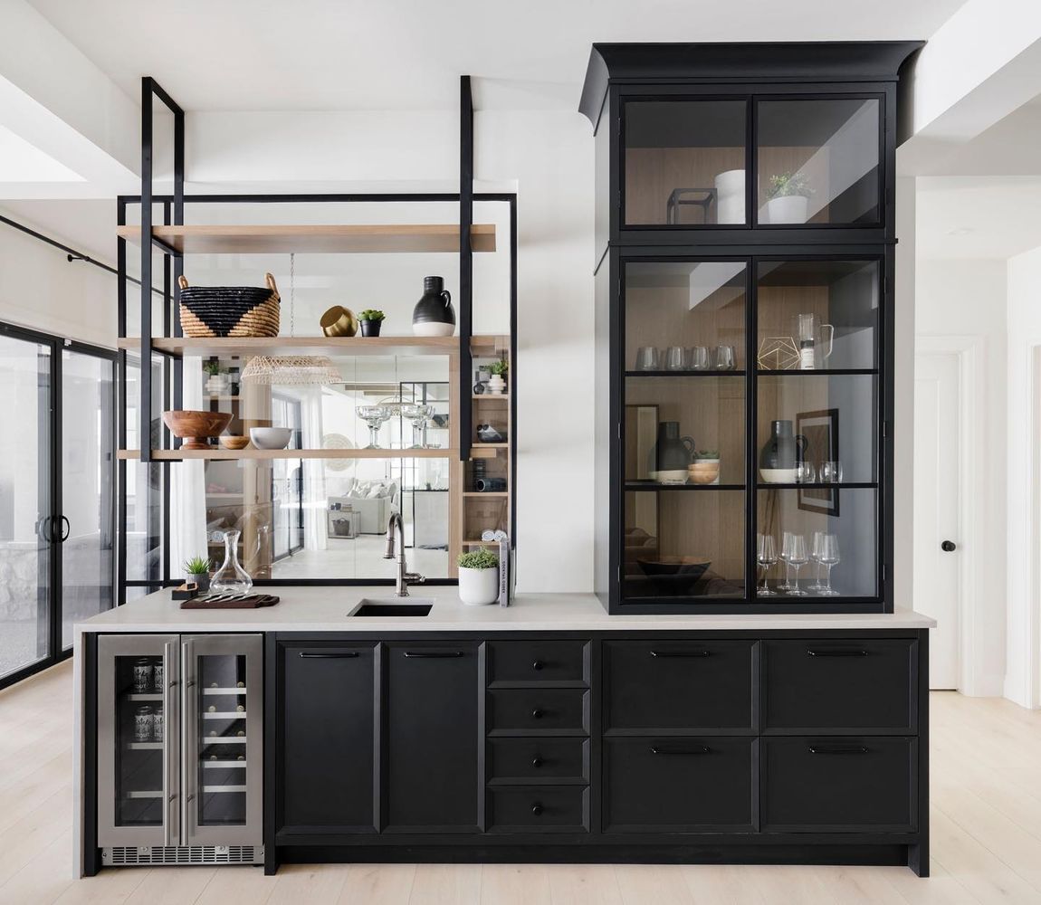 black kitchen with glass cabinets smithericksondesigns