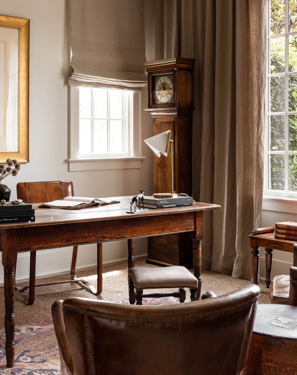 grandfather clock in corner of rustic home office