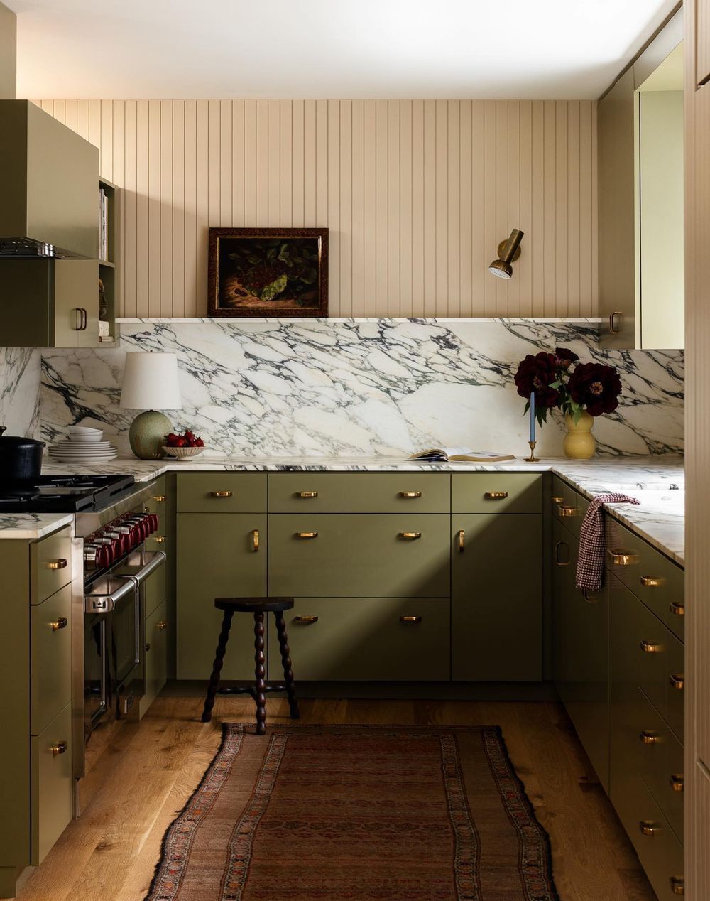 Green kitchens design with marble backsplash @meghan.eisenberg.jpg