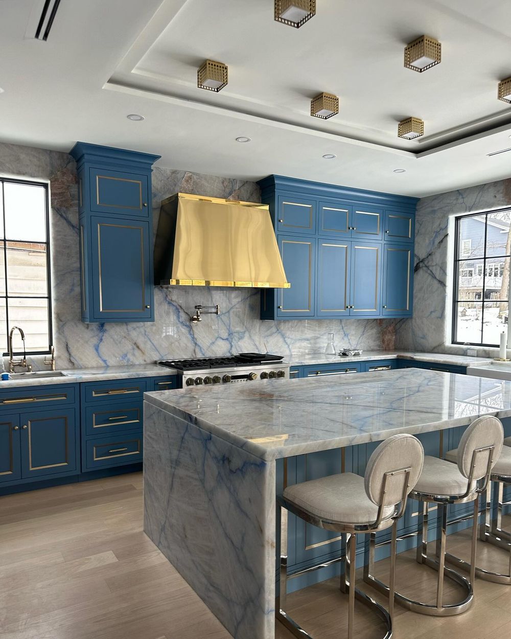 Cobalt blue kitchen with marble ariellahorowitzdesigngroup