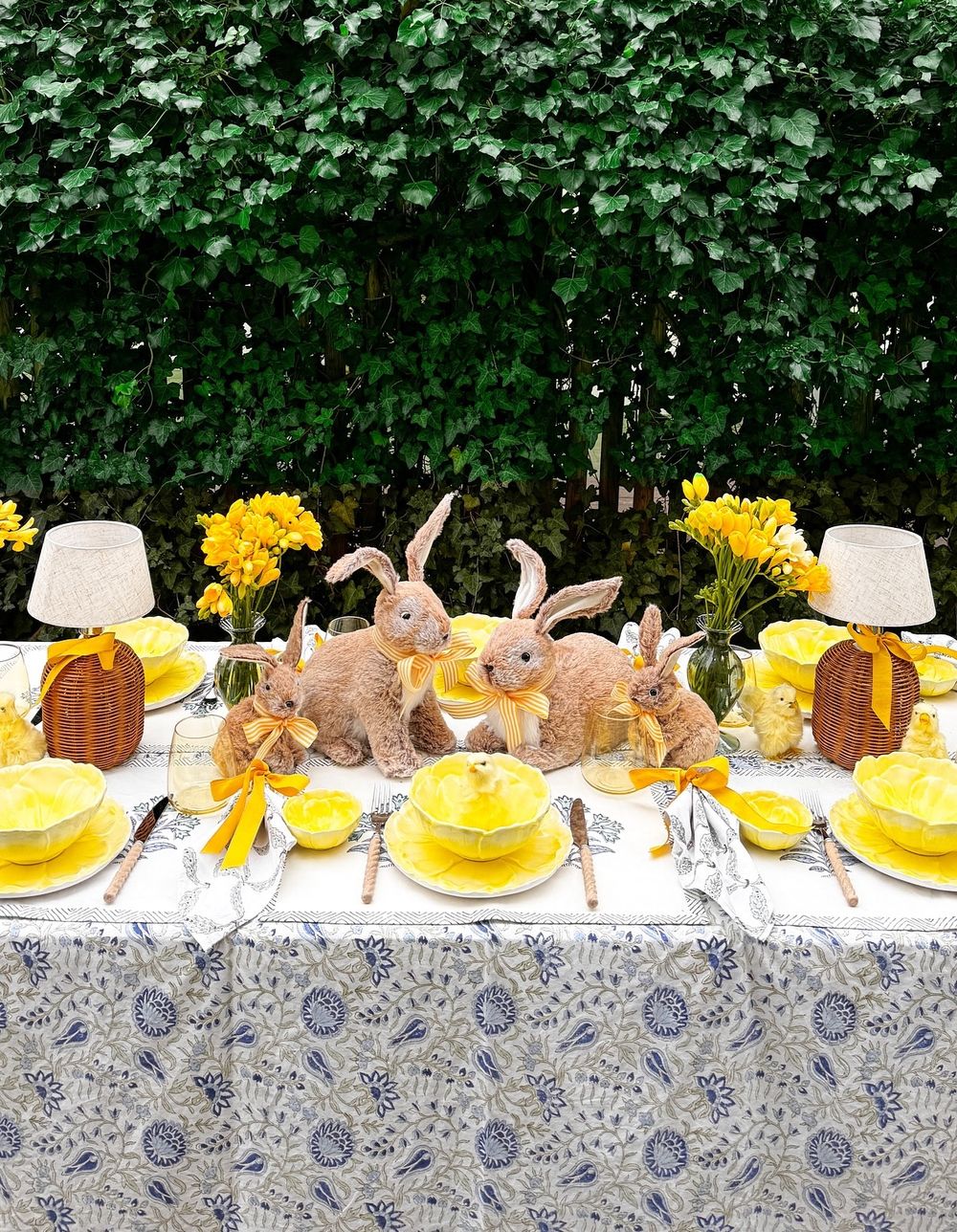 Easter table setting yellow dishes wicker bunny tabledesires