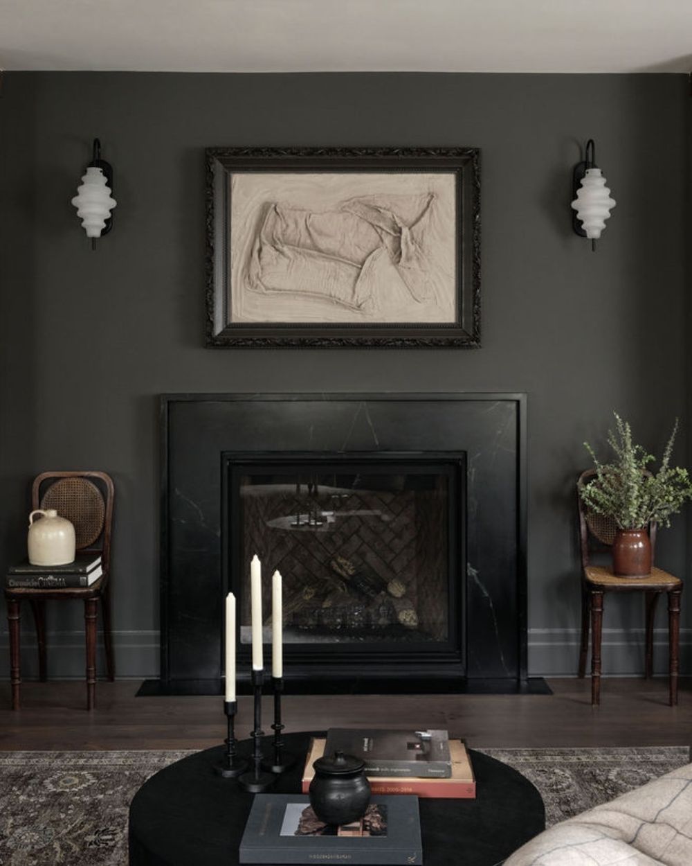 Dark and moody interior design fireplace @brianmccourtdesigns