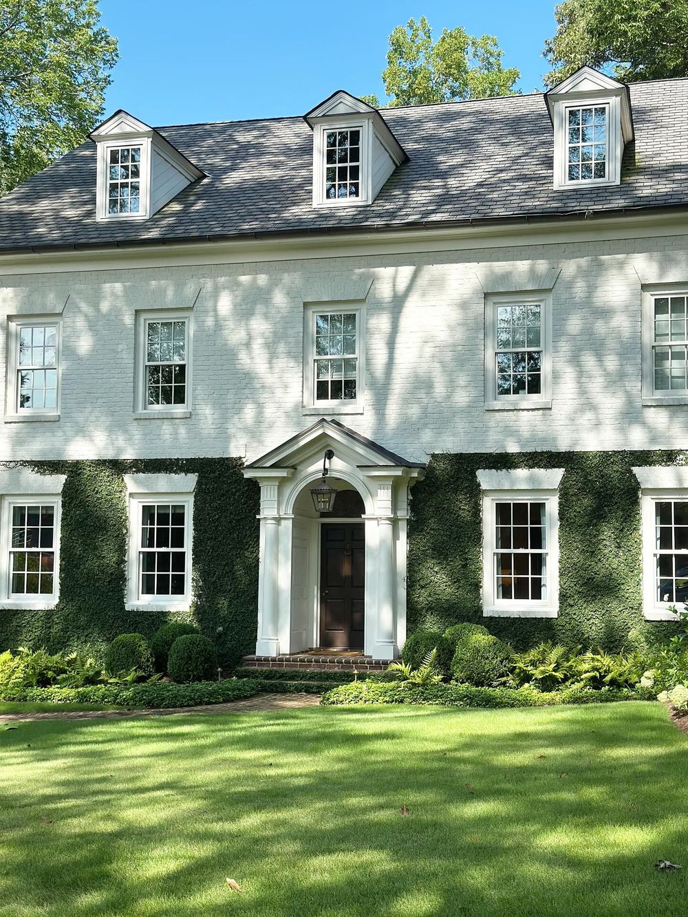 Ivy covered house white brick ashleyaltenbach